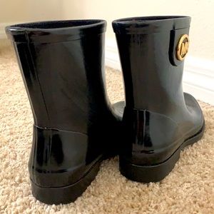 MK black and gold rain books 6